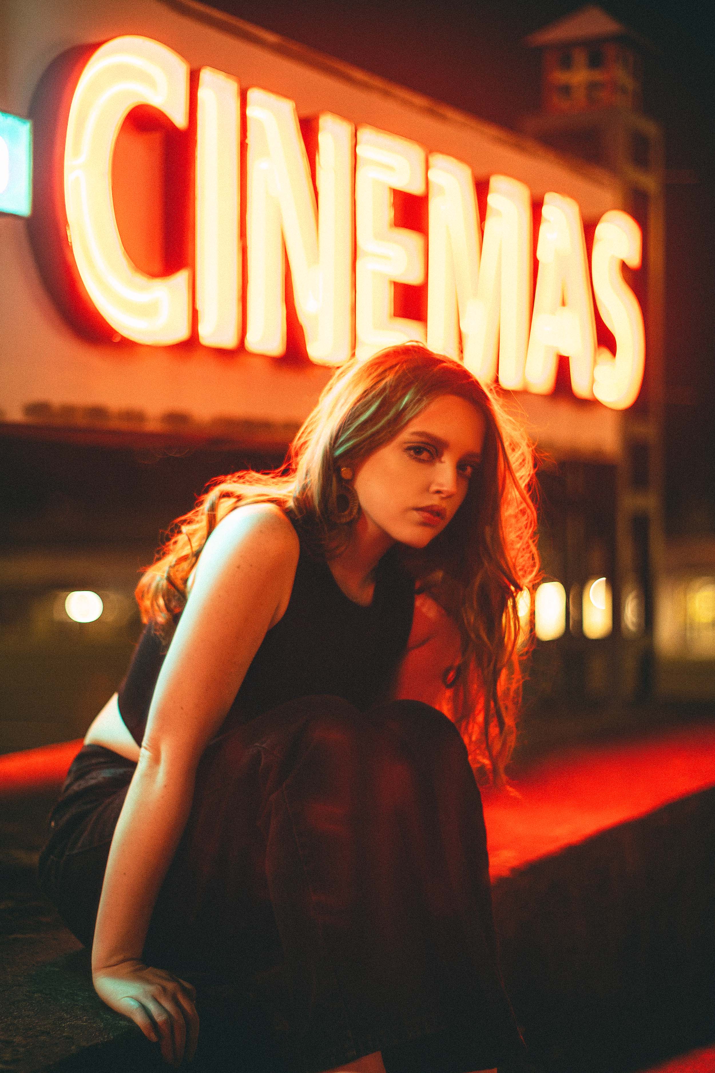 Cinematic Portraits with Vintage Flair by a Movie Theater — photograph 35 of 35